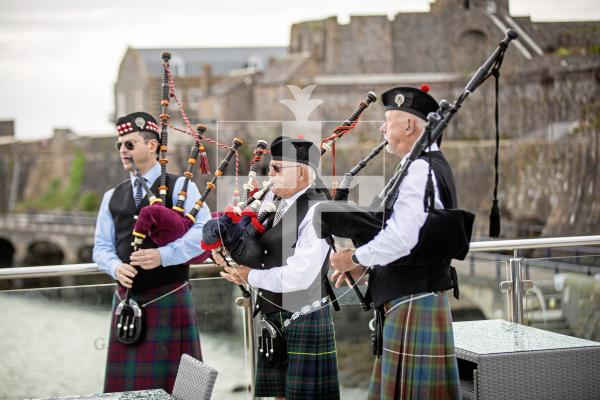 Picture by Sophie Rabey.  27-05-24.  The final piping of the D-Day pipers at 8am this morning on the balcony of GYC.