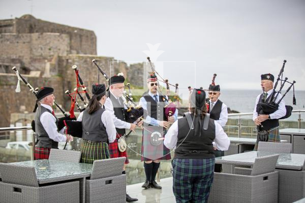 Picture by Sophie Rabey.  27-05-24.  The final piping of the D-Day pipers at 8am this morning on the balcony of GYC.