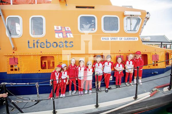 Picture by Sophie Rabey.  04-06-24.  The 12th St Marys Rainbows visited the St Peter Port Lifeboat.  The girls are working towards the 'Mayday Mayday' badge produced by Girlguiding Southwest England, celebrating the 200th anniversary of the RNLI.