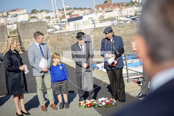 Picture by Sophie Rabey.  05-06-24.  Memorial Service at Castle Emplacement in memory of Flight-Lieutenant John Saville, whose plane crashed in Havelet Bay on 5 June 1944.  He was the leader of Typhoons from 439 Squadron of the Royal Canadian Air Force.
Vice Dean, Reverend Penny Graysmith lead the service.
Dennis Le Moigan did an introduction.