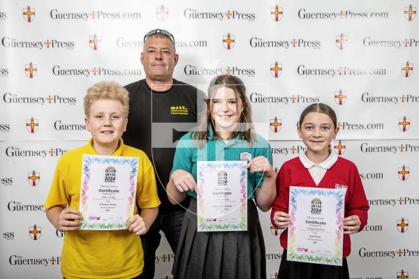 Picture by Peter Frankland.  18-06-24.  Guernsey Press Design An Ad 2024 at St Pierre Park.  
ASR - Sponsor, Paul Knight, Students L-R Alex Lilley (3rd), Lexi Knight (2nd), Maiya Batiste (3rd)