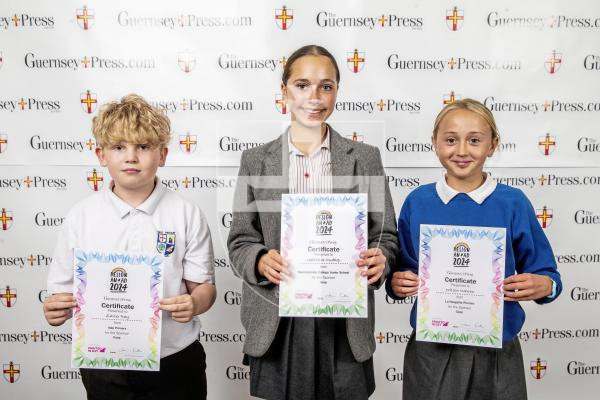 Picture by Peter Frankland.  18-06-24.  Guernsey Press Design An Ad 2024 at St Pierre Park.  
Coop - Sponsor, N/A, Students L-R Zavier Ray (3rd), Gabriella Oudhop (2nd), Willow Warren (1st).