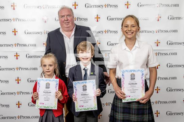 Picture by Peter Frankland.  18-06-24.  Guernsey Press Design An Ad 2024 at St Pierre Park.  
Doyle Motors - Sponsor, Jeremy Rees, Students L-R Jessica Fenwick (3rd), Alistair Doucy (2nd), Lotte Bolton (1st).