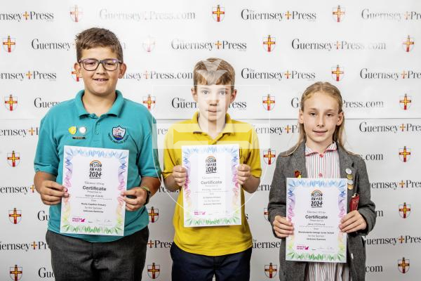 Picture by Peter Frankland.  18-06-24.  Guernsey Press Design An Ad 2024 at St Pierre Park.  
Jacksons Guernsey - Sponsor, N/A, Students L-R George Clark (3rd), Finlay Merrien (2nd), Jane Ozanne (1st).