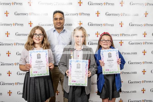 Picture by Peter Frankland.  18-06-24.  Guernsey Press Design An Ad 2024 at St Pierre Park.  
Les Cotils - Sponsor, Chris Moutou, Students L-R Isabella Robilliard (3rd), Verity Maides (2nd), Mya Leale (1st).