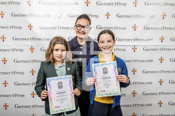 Picture by Peter Frankland.  18-06-24.  Guernsey Press Design An Ad 2024 at St Pierre Park.  
Ogiers - Sponsor, Katy Longan, Students L-R Beatrice Holland (3rd), Florence Cook (1st).
