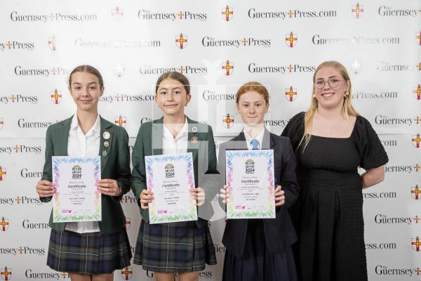 Picture by Peter Frankland.  19-06-24.  Guernsey Press Design An Ad 2024 at St Pierre Park. 
Butterfield - Sponsor, Bella Lee, Students L-R Lily Hurrell (3rd), Bea Wilson (2nd), Chloe Wooldridge (1st).