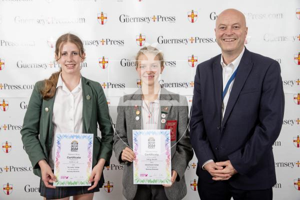 Picture by Peter Frankland.  19-06-24.  Guernsey Press Design An Ad 2024 at St Pierre Park. 
Guernsey Electricity - Sponsor, Matt Jones, Students L-R Caitlin Lee (2nd), Holly Smith (1st)