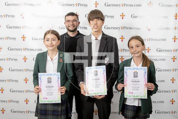Picture by Peter Frankland.  19-06-24.  Guernsey Press Design An Ad 2024 at St Pierre Park. 
Guernsey Mobility - Sponsor, Ethan Tonks, Students L-R Bea Wilson (3rd), Fin Ferguson (2nd), Freya Kelling (1st)