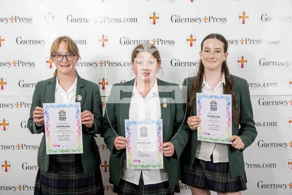 Picture by Peter Frankland.  19-06-24.  Guernsey Press Design An Ad 2024 at St Pierre Park. 
Jacksons Guernsey - Sponsor, N/A, Students L-R Charlotte Hunter (3rd), Erin McKenna (2nd), Emily Dodd (1st).