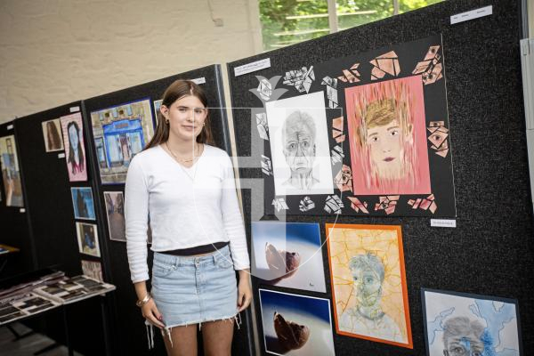 Picture by Sophie Rabey.  21-06-24.  Blanchelande College A Level and GCSE Art Show.
Sophia Newton (16) next to her GCSE artwork.