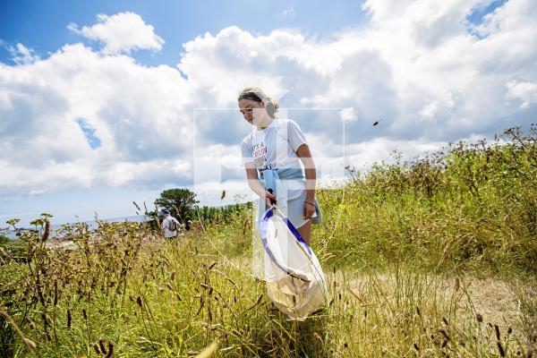 Picture by Sophie Rabey.  22-06-24.  Bug hunt st Bordeaux put on by Nature Guernsey and the Entomology Section of La Societe.
Izzy Marquis (11) looking for bugs on Bordeaux mound.
