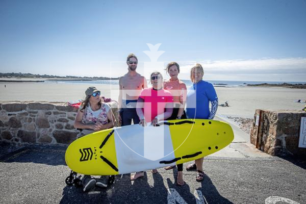 Picture by Peter Frankland. 24-06-24 Sophie Veron is off to compete in a national surfing competition at the Bristol Wave (a wave pool). She is taking part in the adaptive surfing competition. L-R - Channel Island adaptive surfing champion Rhaya Sarre, Instructor Ben Clifford, Sophie Veron, instructors Rachael green and Rebekah Kellow.