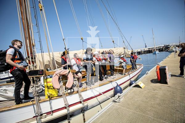 Picture by Sophie Rabey.  26-06-24.   School children have been out on the water for Set Sail Trust's Pilot Cutters Week.  
Vauvert school pupils showing the crew their school dance routine.