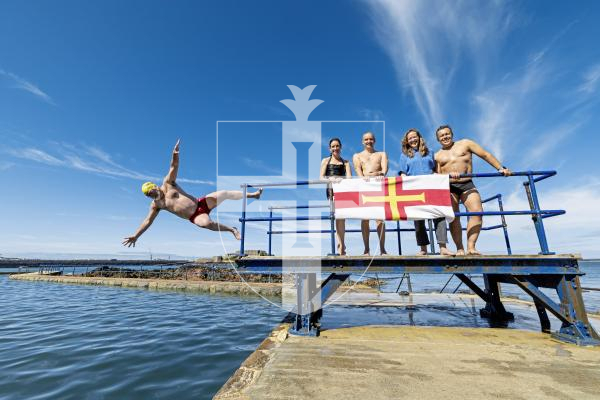 Picture by Peter Frankland. 26-06-25 The diving board at the Bathing Pools has been re-instated following health and safety concerns. L-R - Adrian Sarchet, Lindsay De Sausmarez, Laurie Watson, Helen Bonner-Morgan and Mark Torode.
