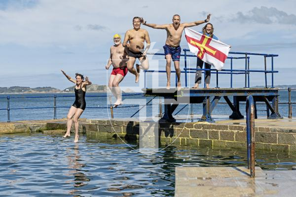 Picture by Peter Frankland. 26-06-25 The diving board at the Bathing Pools has been re-instated following health and safety concerns. L-R - Lindsay De Sausmarez, Adrian Sarchet, Mark Torode, Laurie Watson and Helen Bonner-Morgan.