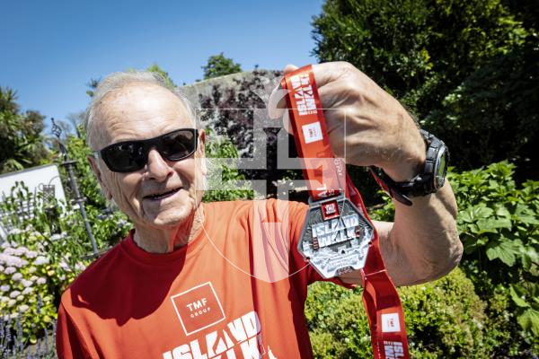 Picture by Peter Frankland. 30-06-25 82 year old Mike Pitcher was the oldest male to complete the round Jersey walk.