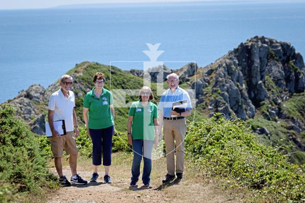 Picture by Peter Frankland. 03-07-25 Floral Guernsey judging at Le Gouffre. The judges were shown around the cliff paths at the end of their tour to have a look at the natural flora on offer in the parish. L-R - Gary Le Poidevin, Sarah Plumley, Jenny Falla and Rae Beckwith.
