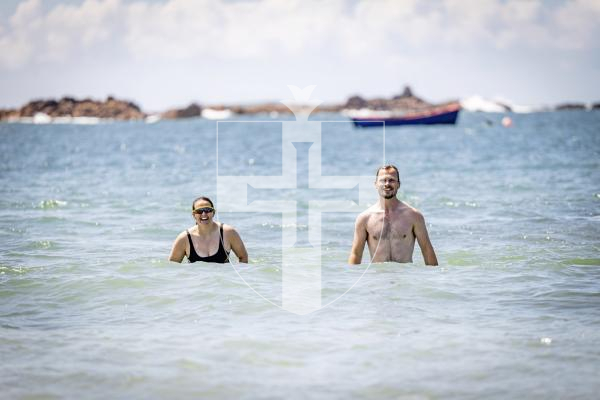 Picture by Sophie Rabey.  07-07-25.  Ellie Tanguy and Matt Holland have taken on the challenge of swimming the full 30 bays in 30 days for Les Bourgs Hospice in one day.  Met them at Grande Rocque, almost half way through the challenge.