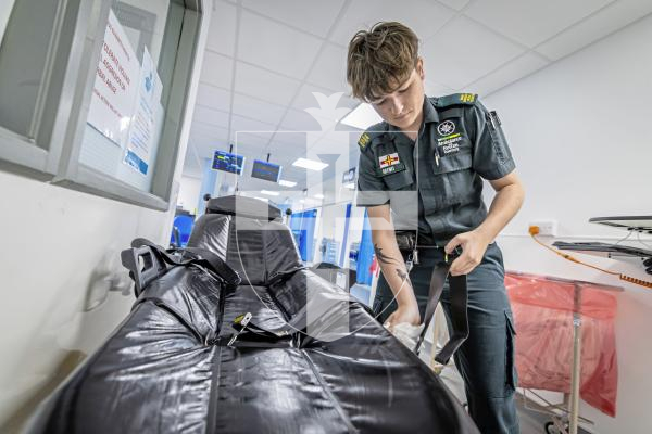 Picture by Peter Frankland. 07-07-25 The Guernsey Press have been invited on a shift with the Ambulance and Rescue Service to observe what they do. For World Paramedic Day feature. Trainee Emergency Medical Technician Mimi Le Flocq. Cleaning the stretcher after a job.