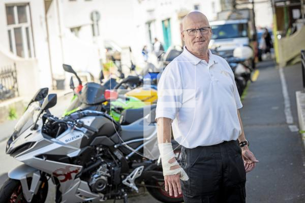 Picture by Peter Frankland. 07-07-25 Wayne Olliver recently fell off his motorbike on Kings Road when he sliped on a manhole cover and needed surgery to his hand. He is concerned that there are many in the island which are unsafe for motorcyclists and cyclists.