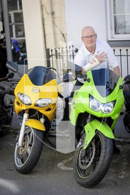 Picture by Peter Frankland. 07-07-25 Wayne Olliver recently fell off his motorbike on Kings Road when he sliped on a manhole cover and needed surgery to his hand. He is concerned that there are many in the island which are unsafe for motorcyclists and cyclists.