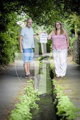 Picture by Peter Frankland. 07-07-25 A petition has been started against the proposals to cover the stream in the Water Lanes to allow cyclists to use the area. Darren and Natalie Davison of La Couture Inn have started the petition.