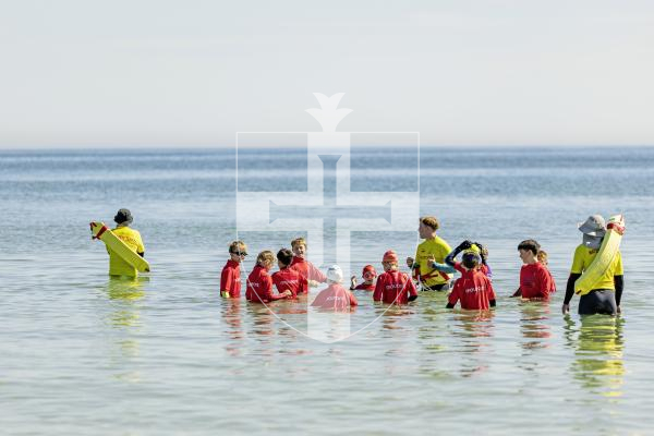 Picture by Sophie Rabey.  10-07-25.  As part of the Cultural Enrichment Programme, Guernsey Sports Commission collaborated with Education to run Water Confidence Beach Sessions for all Year 4 pupils.  Capelles enjoyed a session today on Pembroke.