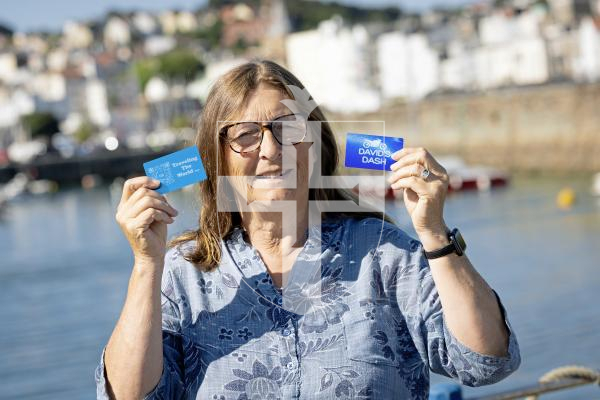 Picture by Peter Frankland. 12-07-25 Alison Joyce with some of the aluminium cards which people can find and scan the QR code to hear about he son's story, his mental health problems and eventual suicide. The idea is that his journey continues after his death by people leaving inspiring thought or messages on the website.