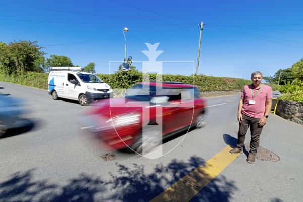Picture by Peter Frankland. 12-07-25  A filter is to be installed at this junction in Les Vaurioufs. Paul James is from Traffic and Highways.
