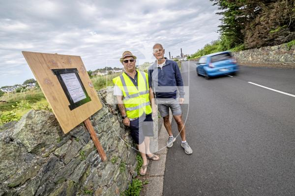 Picture by Peter Frankland. 14-07-25 L-R - Joe Abbotts and Karl Guille of St Sampson's Douzaine at the site in the Saltpans where plans are being made to put in two roads to service a new housing development.