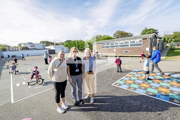 Picture by Sophie Rabey.  16-09-25.  La Mare De Carteret Primary School have had some new playground markings added over the summer break.  It was funded through the schools PTA and the Health Improvement Commission, with the hope to increase physical activity amongst the pupils and help their confidence on bikes etc.
L-R Kate Winter (PTA), Juliet Ford (Deputy Head Teacher) and Alex Costen (Health Improvement Commission)