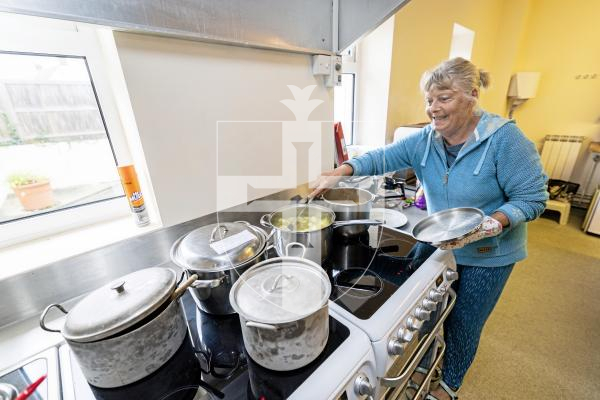 Picture by Sophie Rabey.  20-09-25.   Forest Methodist Church held their ever popular Soup and Cake event.  
Debbie Dorey heating up the soups.