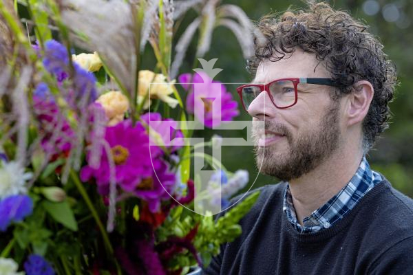 Picture by Peter Frankland. 08-10-25 Florist John Paul Deehan is over at the invite of Floral Design Guernsey. Here he is pictured putting together some designs using some locally sourced materials.