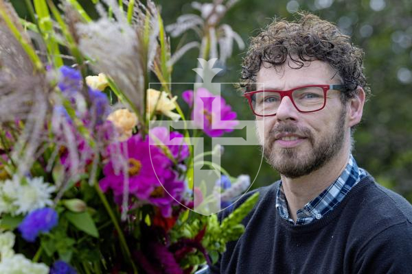 Picture by Peter Frankland. 08-10-25 Florist John Paul Deehan is over at the invite of Floral Design Guernsey. Here he is pictured putting together some designs using some locally sourced materials.