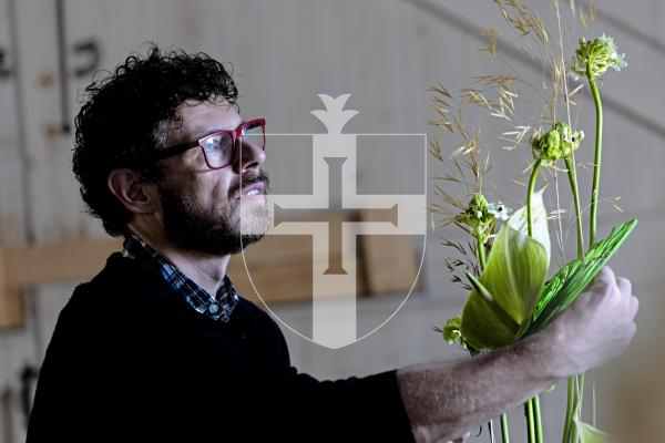 Picture by Peter Frankland. 08-10-25 Florist John Paul Deehan is over at the invite of Floral Design Guernsey. Here he is pictured putting together some designs using some locally sourced materials.