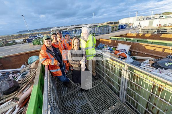 Picture by Sophie Rabey.  15-10-25.  Katie Thomas lost her engagement ring and wedding ring in black bag waste last week after her 3-year-old daughter put them in the bin.  After realising they might have been thrown out, she contacted Guernsey Waste and after lots of searching they managed to find both rings.
Household Waste & Recycling Centre staff L-R Zac Hall (site supervisor), Cliff Rousell, Tom Booth, Shane Vidamour and Paul Corbet (customer services officer).  Katie Thomas is pictured centre infront with her rings.
