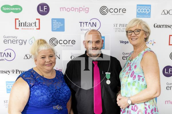 Picture by Sophie Rabey.  18-10-25.  Pride of Guernsey Awards 2025 at St Pierre Park.  Winner of Bailiwick Community Hero – A1 Crab Supplies, Claire and Bernie Le Gallais with sponsor Mandy Collings - Vega Technology.