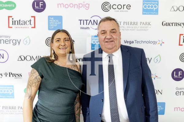 Picture by Sophie Rabey.  18-10-25.  Pride of Guernsey Awards 2025 at St Pierre Park.  Winner of Sports Volunteer of the Year  – Rebecca Meredith with sponsor Tim Nelson - Dominion.