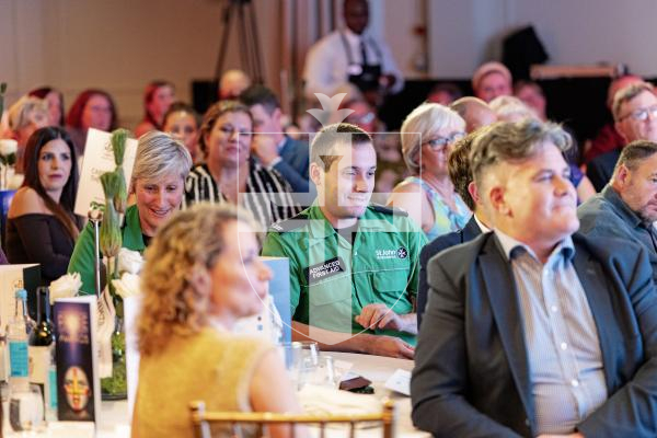 Picture by Sophie Rabey.  18-10-25.  Pride of Guernsey Awards 2025 at St Pierre Park.  Winner of Carer of the Year – St John Event First Aiders Josh Bonsall and Karen Brehaut with sponsor Dame Mary Perkins - Specsavers.