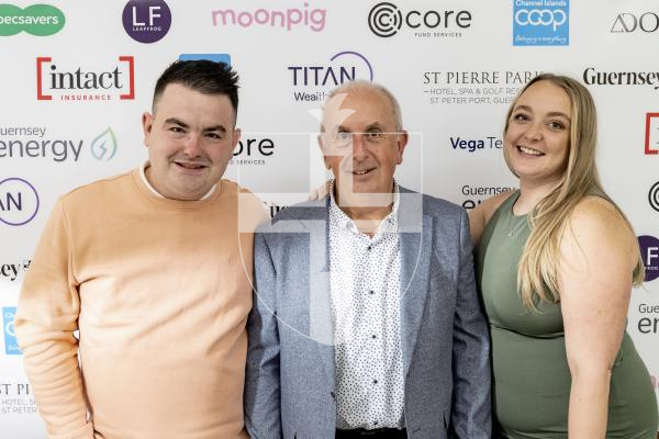 Picture by Sophie Rabey.  18-10-25.  Pride of Guernsey Awards 2025 at St Pierre Park.  Winner of Customer Service of the Year – Bronwyn Anderson & Sean Gordon, with sponsor Andy Patch - Moonpig.