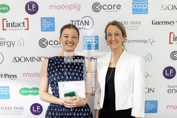Picture by Sophie Rabey.  18-10-25.  Pride of Guernsey Awards 2025 at St Pierre Park.  Winner of Young Achiever of the Year – Eva Redelinghuys with sponsor Elizabeth Raine - St Pierre Park Hotel.
