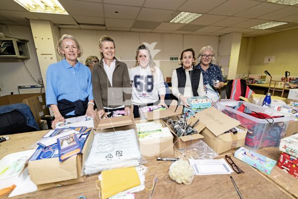 Picture by Sophie Rabey.  23-10-25.   Continued packing of the Rotary Guernesiais shoebox appeal at Breton before the collection ends this weekend.  Louise Cripwell and a team from Government House were on hand today to help check and pack boxes.
L-R Louise Cripwell, Claire Gray, Jenny De Sousa, Maria Freitas and Vanessa Wakeford.