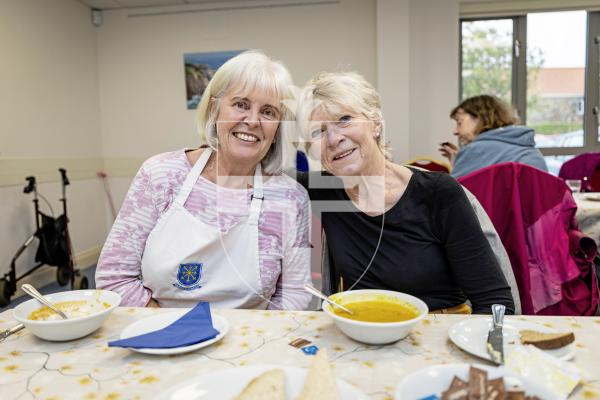 Picture by Sophie Rabey.  23-10-25.  Warm Space soup kitchen held at St Martins Community Centre.  This was the first session back of the winter season and will run through to Easter.  Free soup, bread and hot drinks are on offer for people to come together and enjoy a social lunch.
Sara Dorey and regular visitor Deirdre Lenhoff.