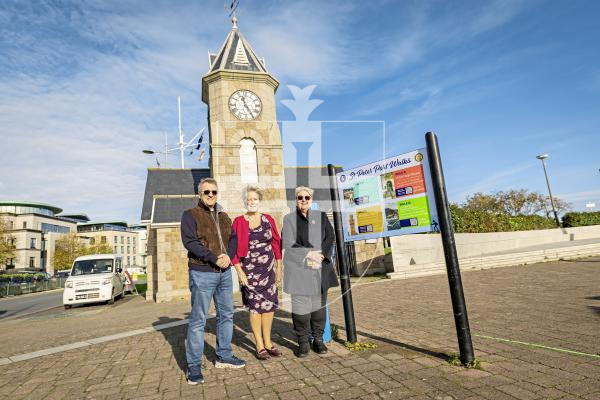 Picture by Sophie Rabey.  12-11-25.  St Peter Port Parish have been working on their latest project of updating and replacing 8 information boards around town.  Smith Signs installed the first one today at the Liberation Monument.
L-R Ken Acott (SPP Constable), Ann Jennings (SPP Parish Deputy Office Manager) and Diane Mitchell (SPP Constable).