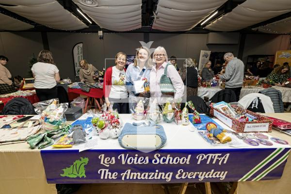 Picture by Sophie Rabey.  16-11-25.  The Beau Sejour Charities Christmas Fayre, organized by the Guernsey Round Table, at Beau Sejour.
Les Voies School PTFA stall L-R Marie Phillippe, Erin Cutter and Janet West.  Janet made a lot of crochet crafts to sell on the stall.