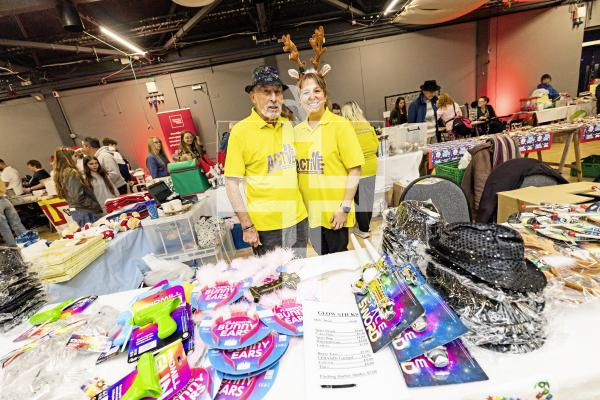 Picture by Sophie Rabey.  16-11-25.  The Beau Sejour Charities Christmas Fayre, organized by the Guernsey Round Table, at Beau Sejour.
Active Guernsey stall L-R Ray Peacegood and Mel Moncrieff.