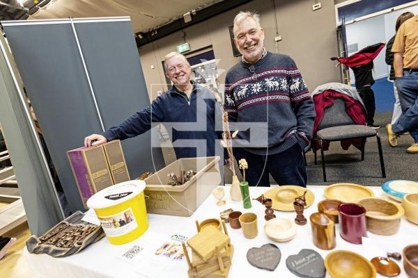Picture by Sophie Rabey.  16-11-25.  The Beau Sejour Charities Christmas Fayre, organized by the Guernsey Round Table, at Beau Sejour.
MenShed stall with lots of woodcrafts made from sessions L-R Ian McCathie and Derrick Thatcher.