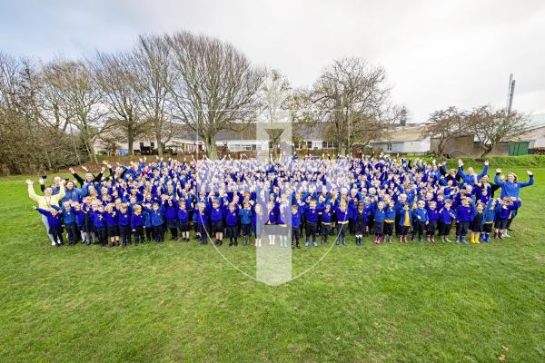 Picture by Sophie Rabey.  19-11-25.  St Martins Primary School are celebrating World Childrens Day that is tomorrow (November 20th).  The whole school in a photo outside on the playing field.
SMSPS
