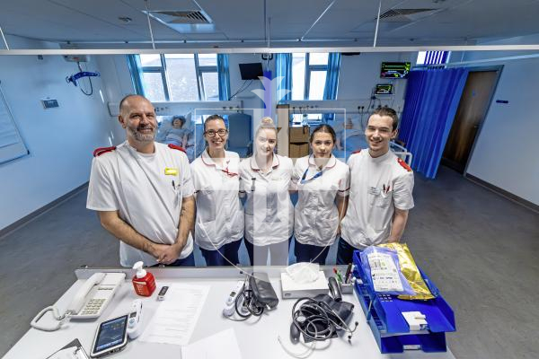 Picture by Peter Frankland. 21-11-25 TGI University Centre at the PEH. Students demonstrating some of the kit they have at the centre. L-R - Student Nurse Associate Lee Sarahs and Student Nurses Tanya Nesbitt, Kayleigh Moullin, Lauren de Jersey and Thomas Rohland.